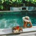 woman with hat in eco friendly pool